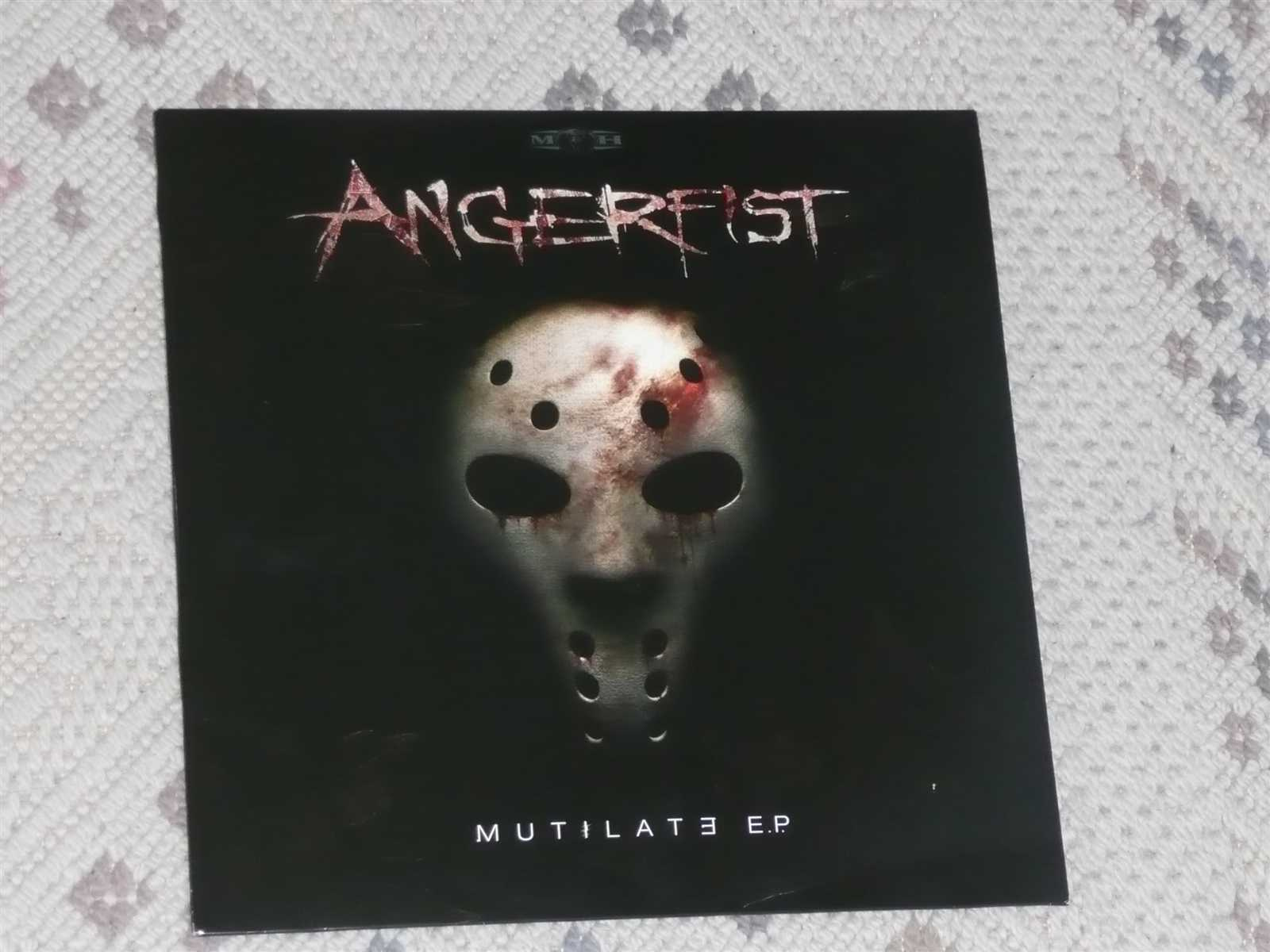 (MOH067) Angerfist - Mutilate (front)