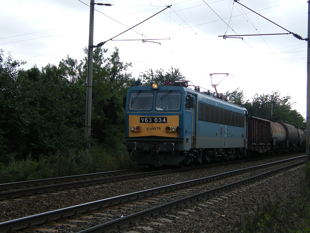 V63 034