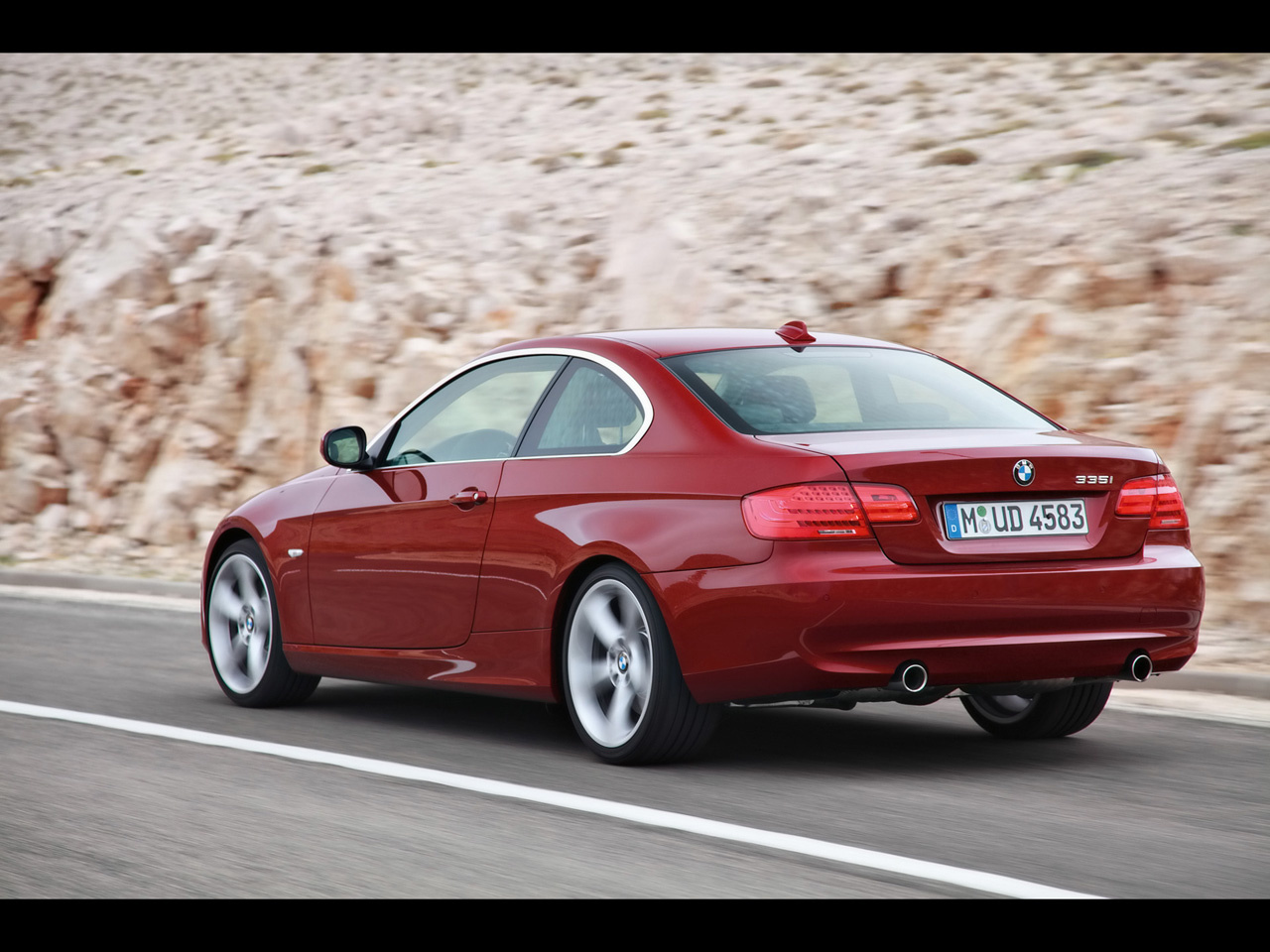 2010-BMW-3-Series-Red-Rear-And-Side-Speed-1280x960